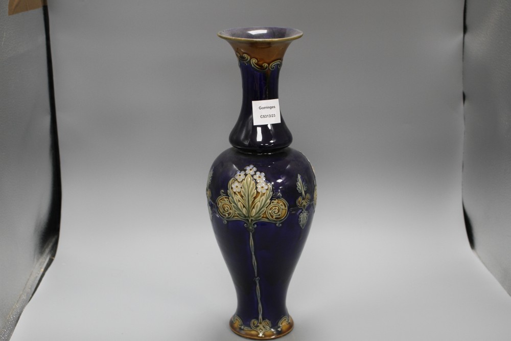A Royal Doulton stoneware baluster vase, with floral decoration, height 42cm
